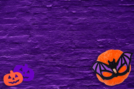 Halloween decorations on purple background. Halloween concept. Flat lay, top view, copy spaceの写真素材