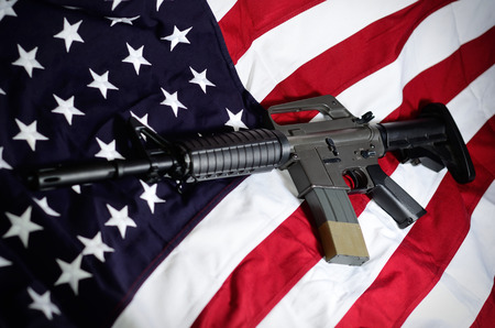 Flag of the USA with rifleの写真素材