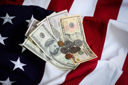 Flag of the USA and moneyの写真素材
