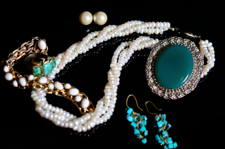 Antique vintage jewelry on black backgroundの写真素材