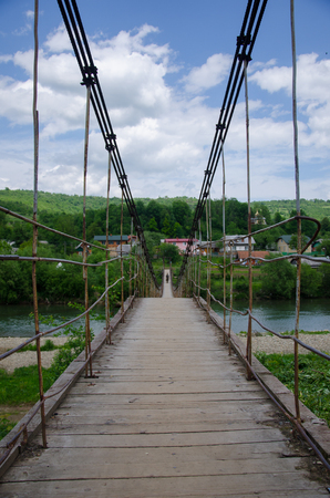 Suspension bridge over the river.の写真素材