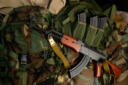 Terrorist Weapons with tactical chest rigs and backpack.の写真素材