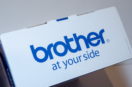 Soest, Germany - January 2, 2018: Cardboard box with logo Brother.  Brother Industries, Ltd. is a Japanese multinational electronics and electrical equipment company.のeditorial素材