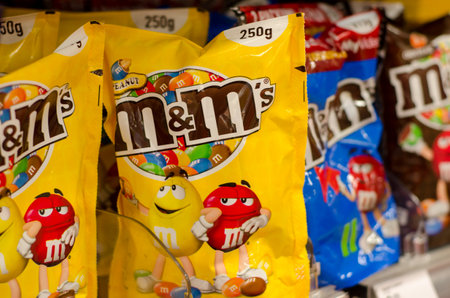 Soest, Germany - January 2, 2018: Closeup of M&M's pack colorful button-shaped chocolates made by Mars Inc.のeditorial素材