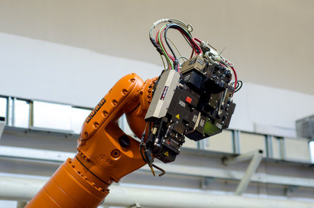 Kyiv, Ukraine - November 22, 2018: KUKA robot arm with Scansonic Laser Brazing.のeditorial素材
