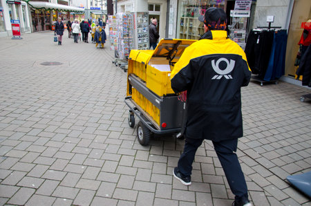 Soest, Germany - December 12, 2018: Deutsche Post postman.のeditorial素材