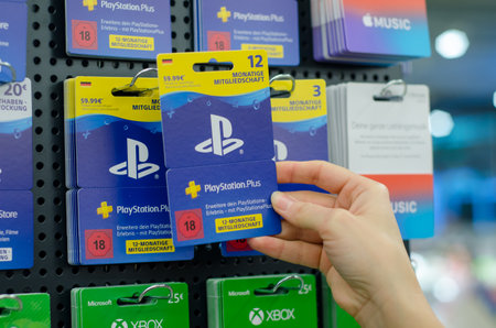 Soest, Germany - January 8, 2019: PlayStation.Plus Cards for sale in the shop.