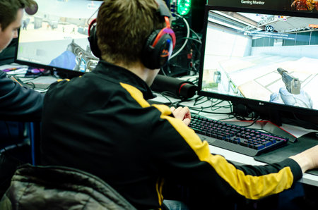 Kyiv, Ukraine - April 12, 2019: The guys are playing a video game.のeditorial素材