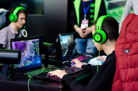 Kyiv, Ukraine - April 12, 2019: The guys are playing a video game.のeditorial素材