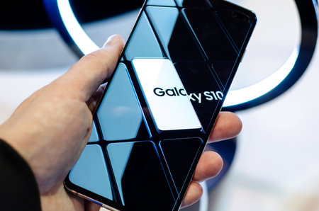 Kyiv, Ukraine - April 12, 2019: Samsung Galaxy S10 Plus in the hand.のeditorial素材