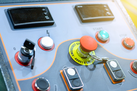 Control panel with buttons, key and switch.の写真素材
