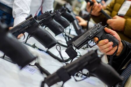Gun Display Stands. Pistols for sale in the store.の写真素材
