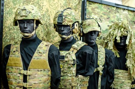Mannequins in military uniform in a military storeの写真素材