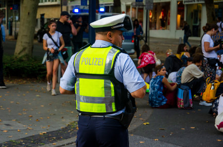 Dortmund, Germany - August 2, 2019: Policeman patrolled and keeps order at the public event.のeditorial素材