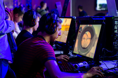 Kyiv, Ukraine - September 28, 2019: The guys are playing a CS:GO video game.