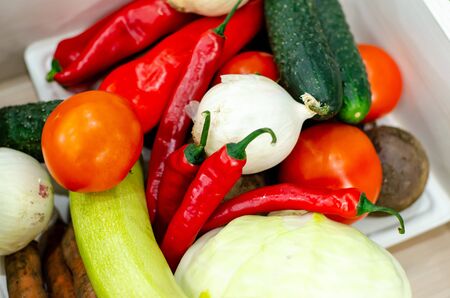 A variety of vegetables on the counter.の写真素材