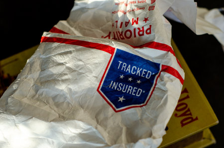 Kyiv, Ukraine - January 19, 2021: used open USPS Priority Mail packageのeditorial素材