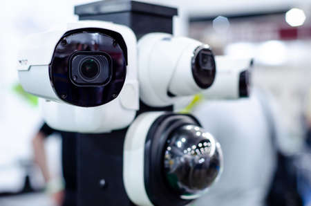 Close-up of surveillance camera in the storeの写真素材