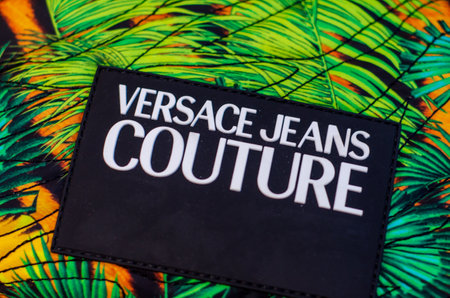 Soest, Germany - August 20, 2021: Versace Jeans Couture logo on clothes.