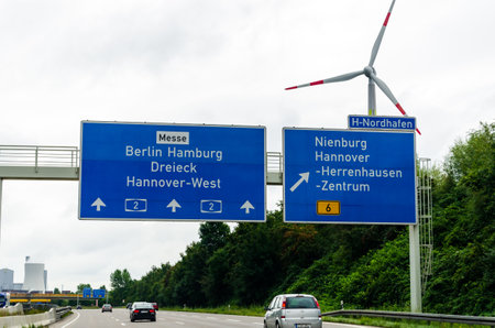 North Rhine-Westphalia, Germany - August 28, 2021: Road traffic on the German Highway (Autobahn, Bundesautobahn) A2 with road signs.のeditorial素材