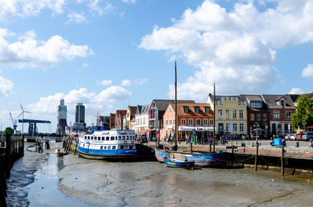 Husum, Germany - August 30, 2021: Husum harbor (Husumer Hafen) at low tide.のeditorial素材