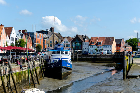 Husum, Germany - August 30, 2021: Husum harbor (Husumer Hafen) at low tide.のeditorial素材