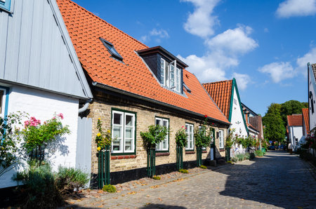 Schleswig, Germany - September 01, 2021: Historic houses in Holm fishing village in Schleswig,...