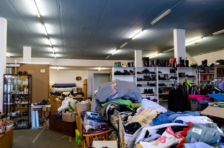 Schleswig, Germany - September 03, 2021: Second hand shop for clothes, furniture and other thingsのeditorial素材