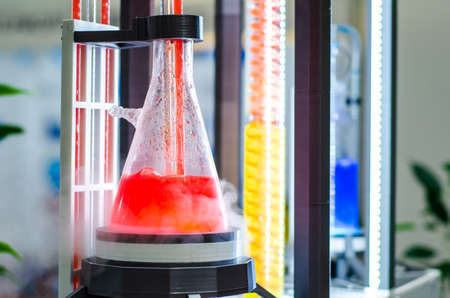 Chemistry laboratory processes. Chemical reaction, solution in tube or flask.の写真素材