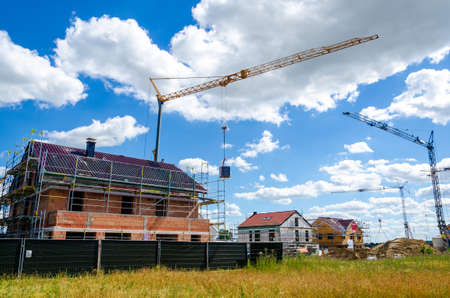 Construction of a new houses. Construction of a new residential area.の写真素材
