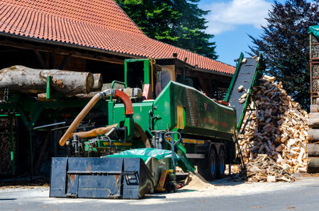 Lippetal, Germany - July 02, 2022: Sawmill, firewood processing machine (SpaltFix K-600 Vario, mobil...