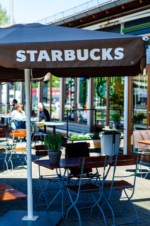 Quickborn, Germany - May 09, 2022: Starbucks logo on the umbrellaのeditorial素材