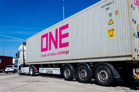Seevetal, Germany - May 09, 2022: ONE cargo container transportation on truck. ONE is the global...