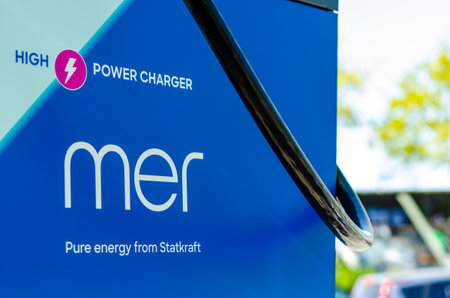 Quickborn, Germany - May 09, 2022: mer power charge station. Mer is a European EV charging company owned by Statkraft.のeditorial素材