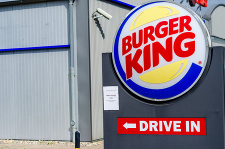 Henstedt-Ulzburg, Germany - May 20, 2022: Burger King restaurant exterior - sign near the entranceのeditorial素材