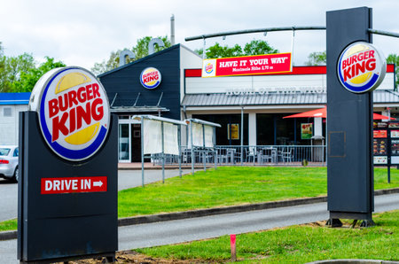 Henstedt-Ulzburg, Germany - May 20, 2022: Burger King restaurant exterior - sign near the entranceのeditorial素材