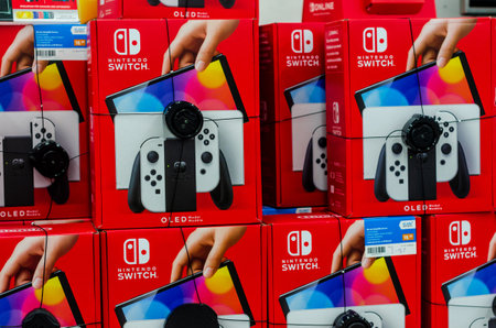 Hamm, Germany - August 20, 2021: Nintendo Switch video game console for sale in the store.のeditorial素材
