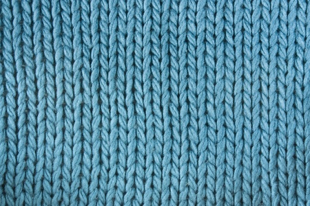 Close-up of a woolen pattern. Knitting pattern 