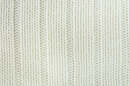 Close-up of a woolen pattern. Knitting pattern 