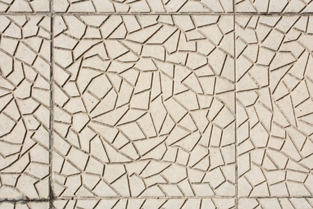 red paving stones with wavy design and circles