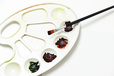 art paint brushes and white canvas mock upの写真素材