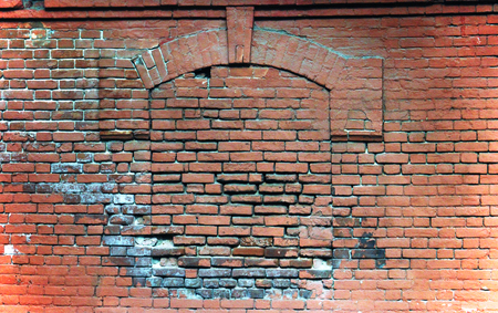 Brick-lined window in old brick wall texture background, red vintage texture.