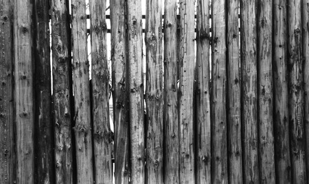 Grey Old Log Cabin Wall Texture. Dark Rustic House Log Wall. Horizontal Timbered Background.の写真素材