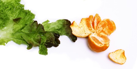 Lettuce and Mandarins isolated on white background.の写真素材