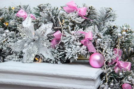 Pastel silver and pink colored decoration for christmas. fireplace decoration for happy new year.の写真素材