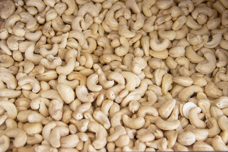 Cashews nut background. kernels of peeled nuts.の写真素材