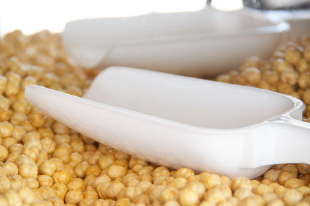 roasted chickpeas on the counter of the store with scoop for typing.の写真素材