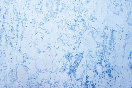light white with blue interspersion points wall marble texture background tabletop natural stone trim.の写真素材