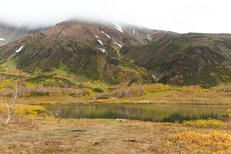 Beautiful colorful autumn landscape in Vachkazhetz volcano, Kamchatka peninsula, Russiaの写真素材