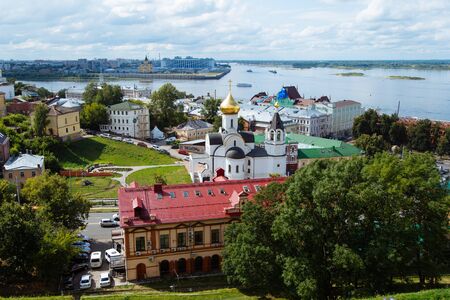 Nizhny Novgorod, Russia, July 12, 2019. Aerial panoramic view of the city in summer day. Church of the Kazan Icon of the Mother of God, Volga river, and historic buildings in the center of old town.のeditorial素材
